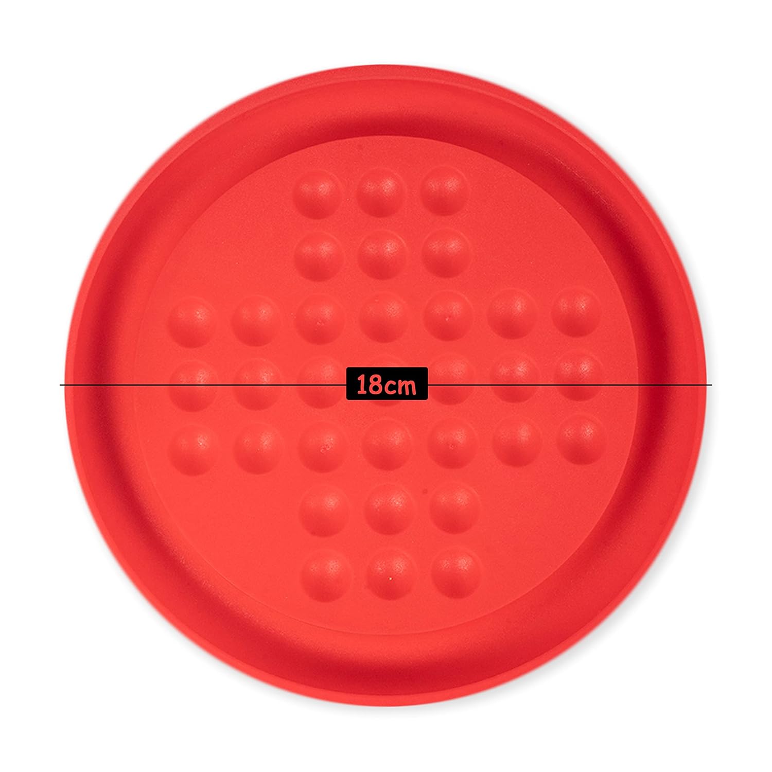 Red circular object with textured surface