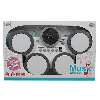 Boxed toy drum set with 'Music Fashion Drum' branding on a white background