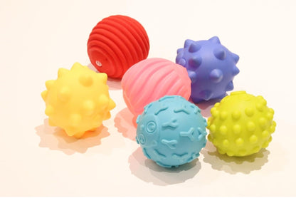 Colorful sensory squeeze balls in various textures for tactile play and stress relief