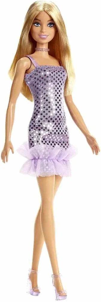 Barbie doll with glitter dress in purple featuring a ruffled hem and matching heels