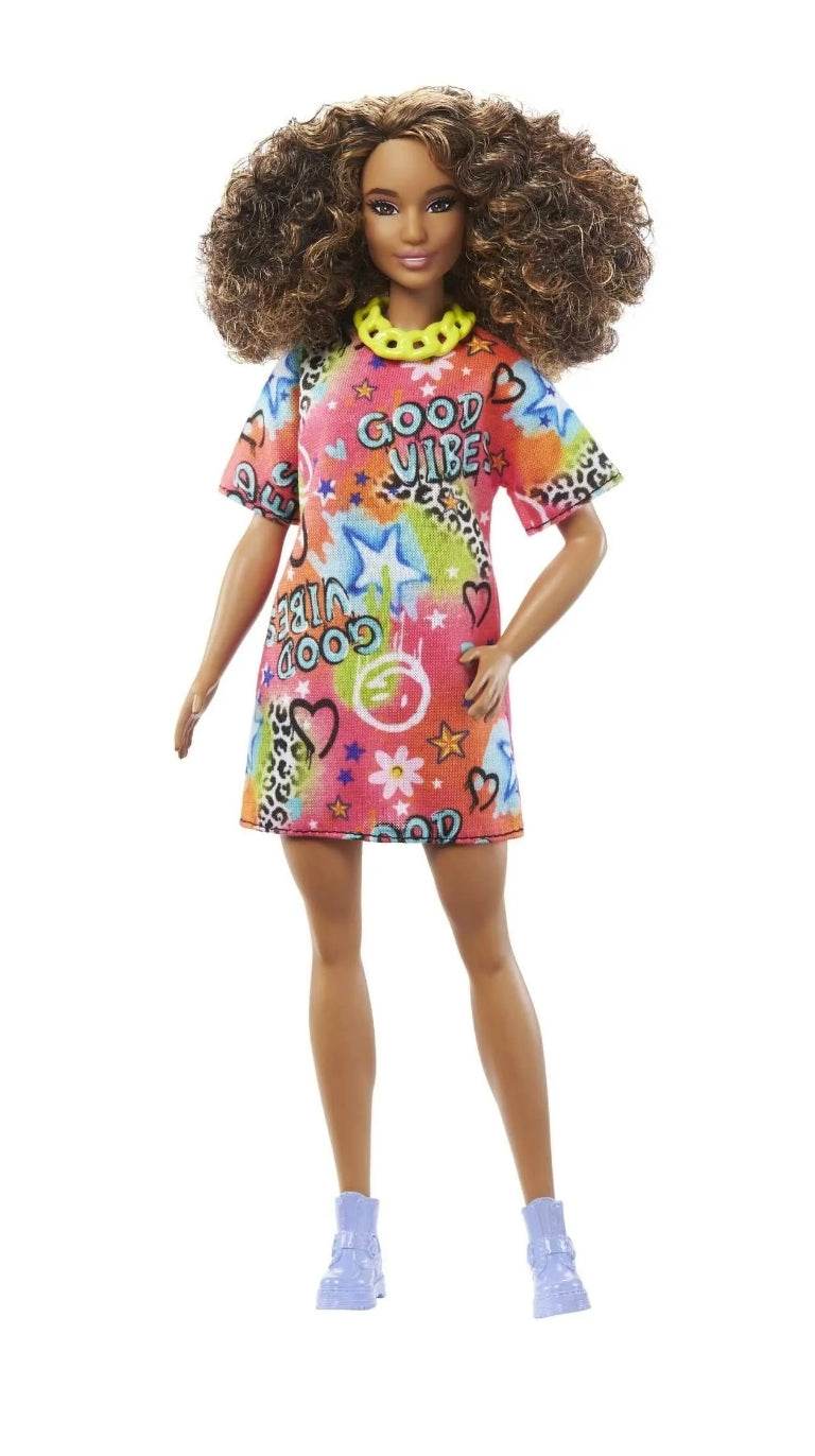 Barbie Fashionista set for girls featuring a doll with curly hair wearing a colorful graffiti dress and purple shoes