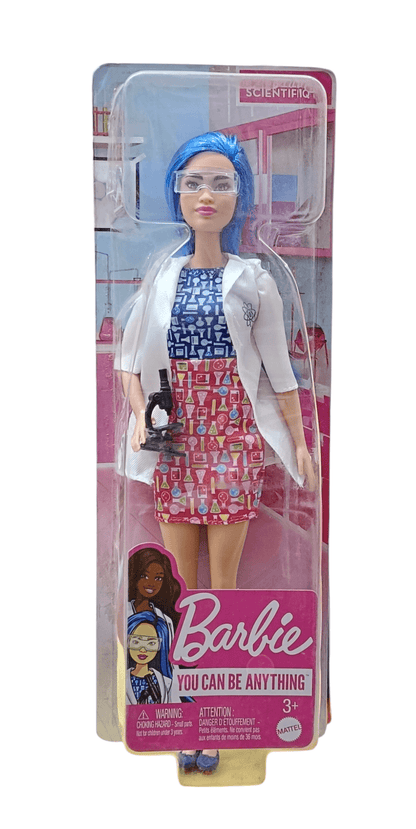Barbie scientist doll with blue hair wearing lab coat and holding a microscope toy