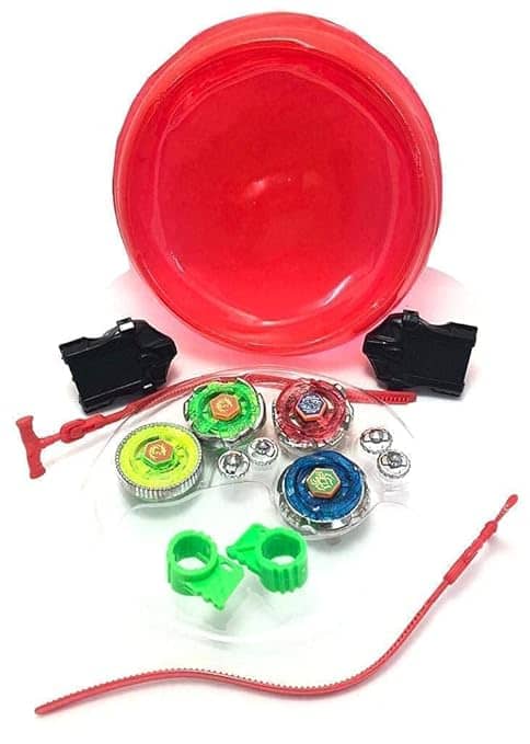 Beyblade spinning tops in vibrant colors with launchers and a red battle arena for ages 8 and up
