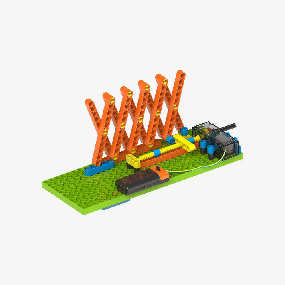 STEM construction toys for kids featuring a colorful mechanical building set with orange and yellow parts on a green base