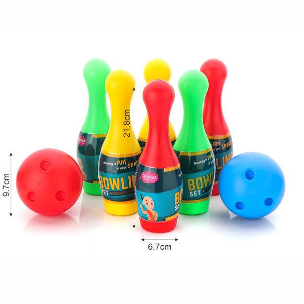 Colorful bowling pin set up for kids with two bowling balls for fun indoor play