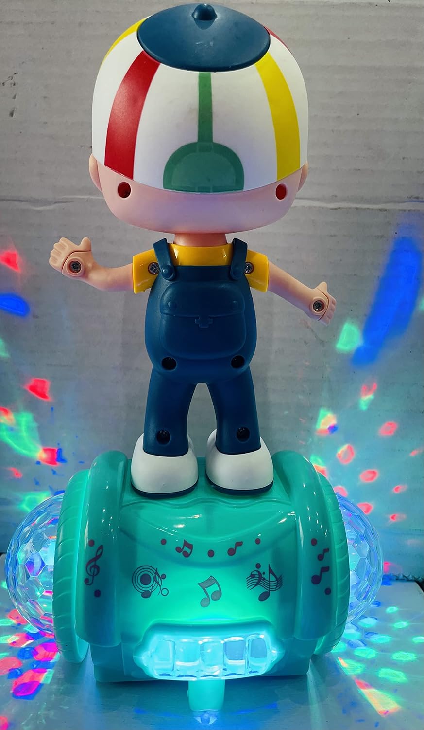Colorful light-up boy toy figure with music and disco effects for ages 3 and up