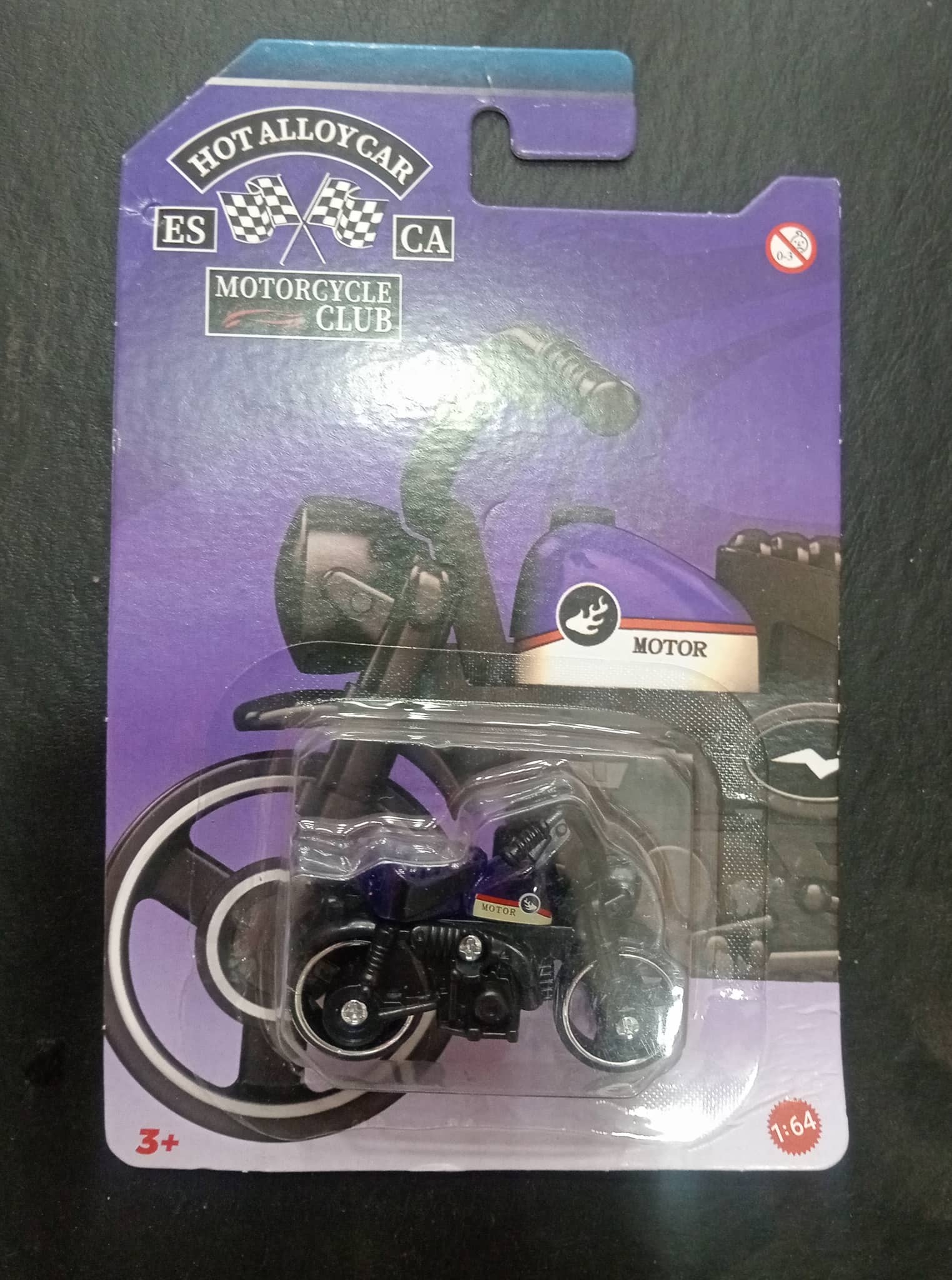 Purple motorcycle toy model for ages 3 and up, featuring cast die hard design