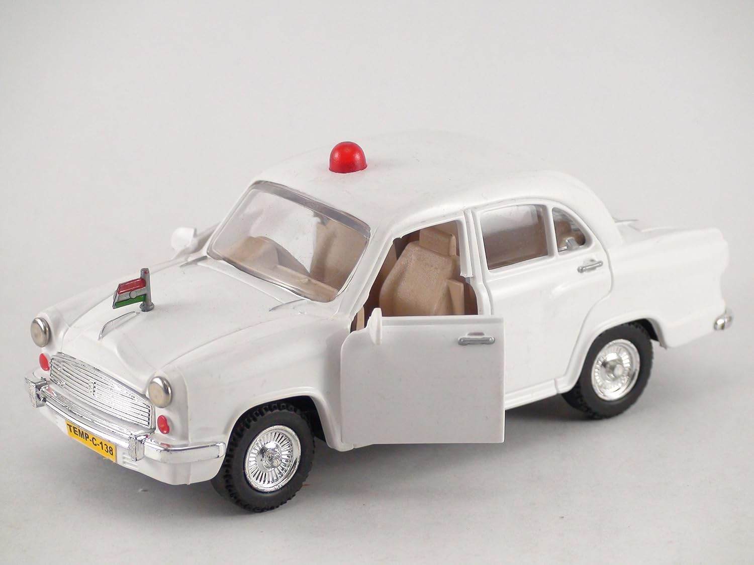 White Centy Ambassador car toy with open door and red roof light by T-Rex the toyland Sitamarhi