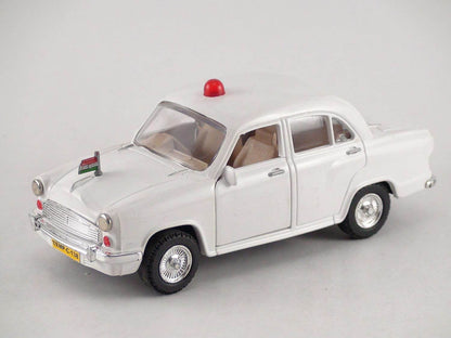White Centy Ambassador car toy with red siren and miniature Indian flag on hood