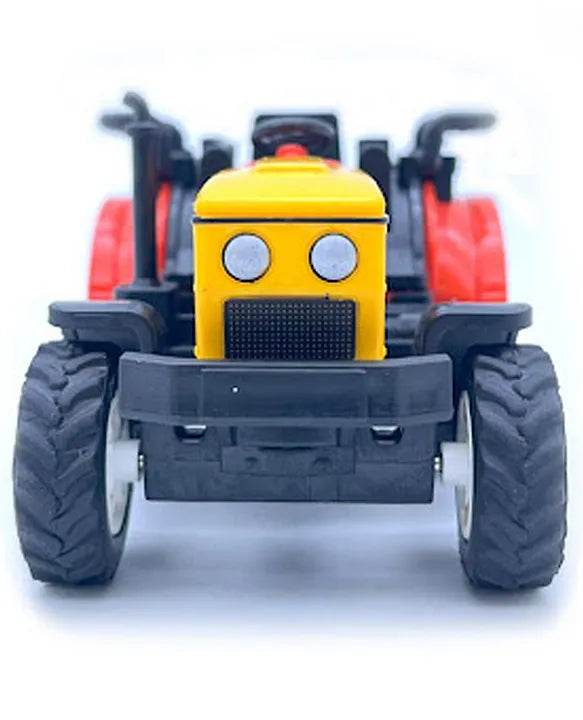 Yellow and red friction powered tractor toy with large black tires from T-Rex the toyland Sitamarhi