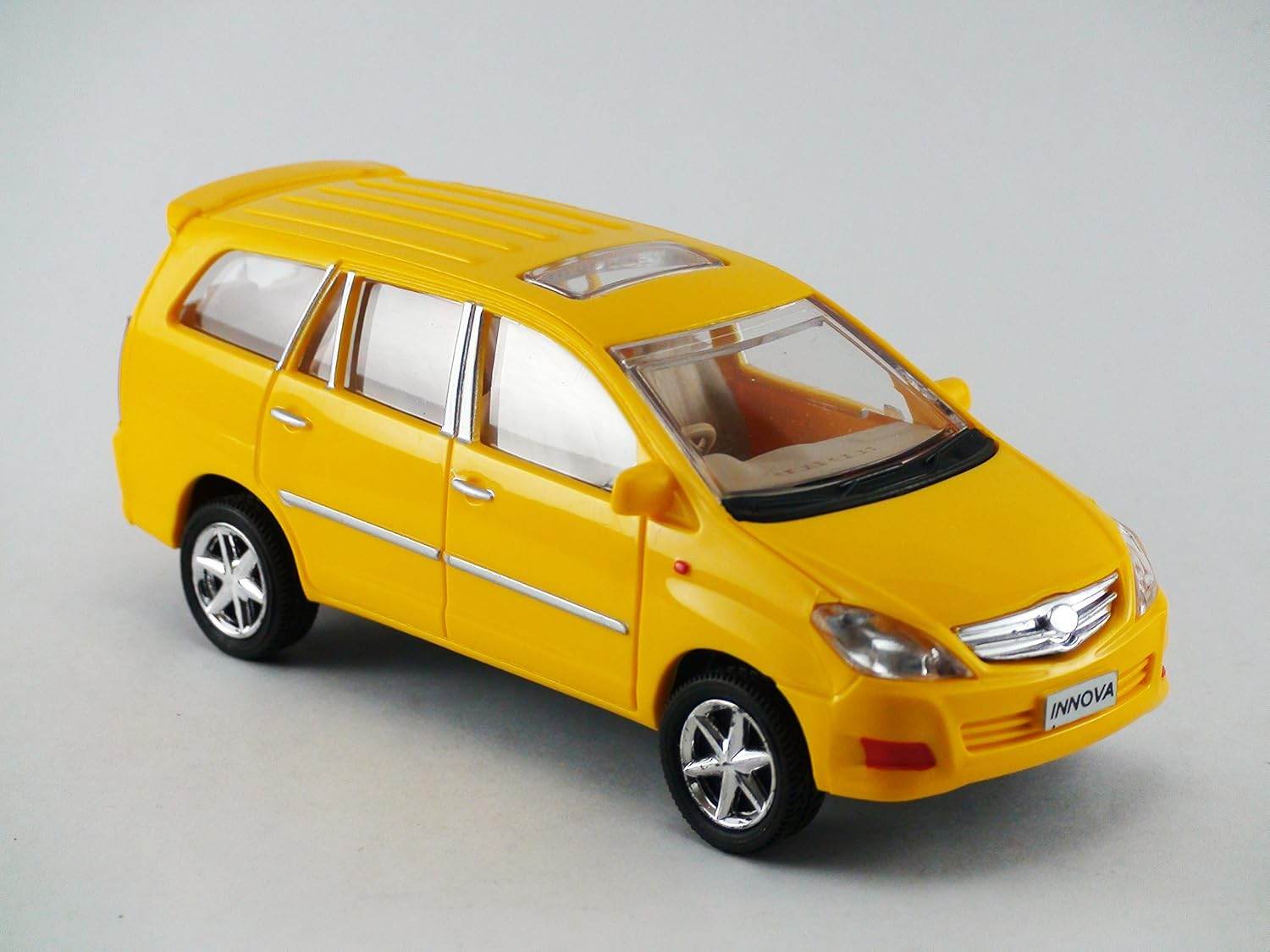 Yellow Centy Toys Innova scale model with detailed exterior and silver rims from T-Rex the toyland Sitamarhi