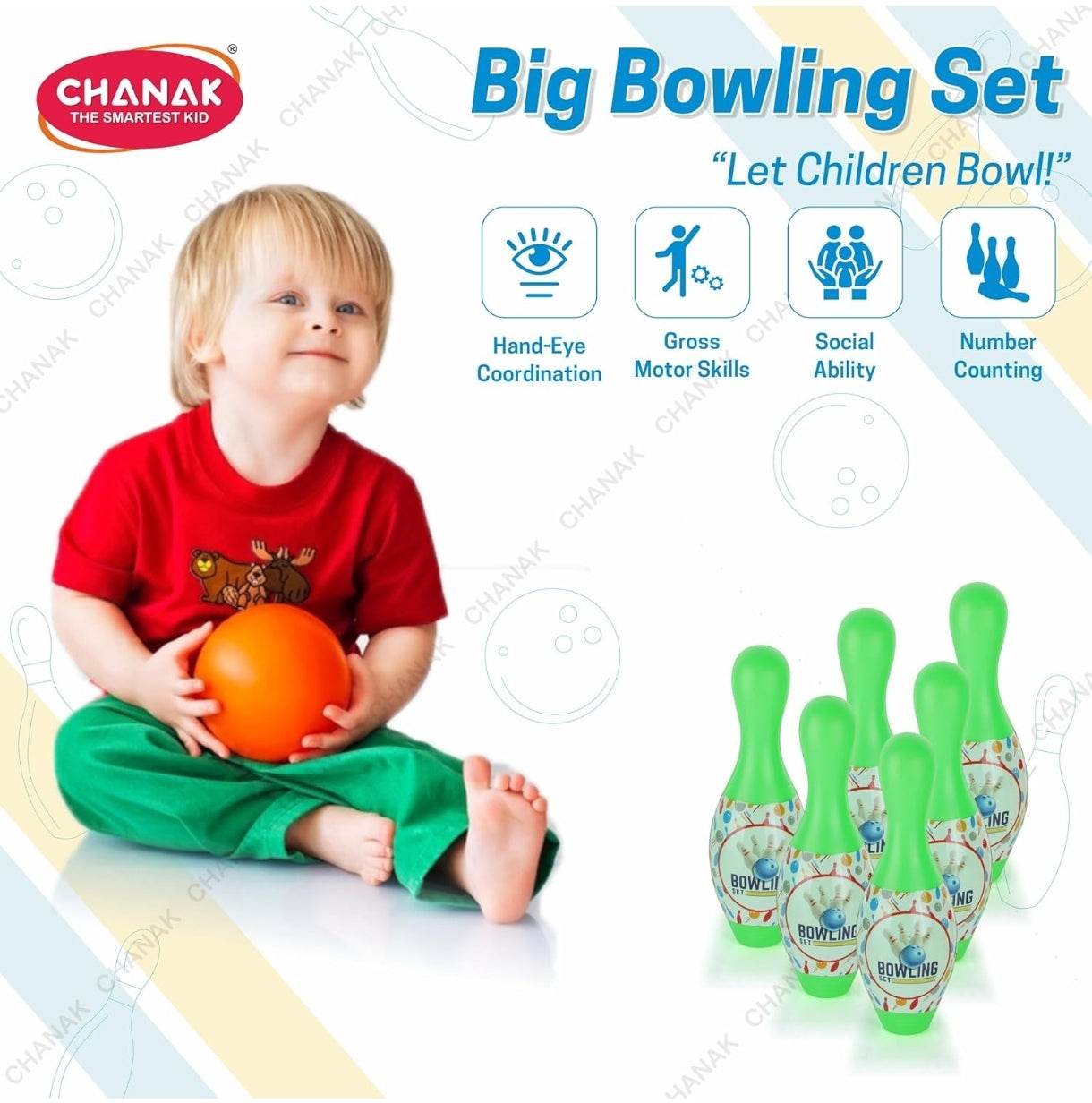 Colorful bowling pins set-up with child playing in red shirt for toddlers