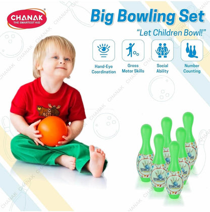 Colorful bowling pins set-up with child playing in red shirt for toddlers
