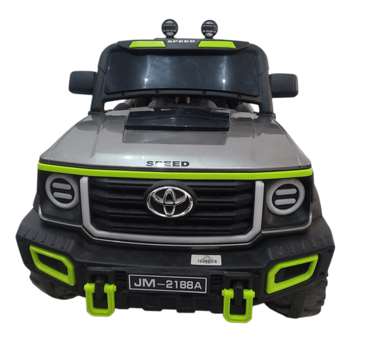 Silver ride-on toy truck with green accents for kids ages 3-7, inspired by Toyota design