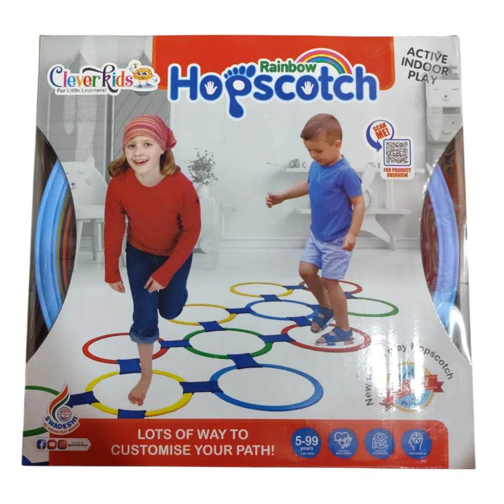 Kids playing on rainbow hopscotch play mat with colorful circles for active indoor play by Prem Ratan