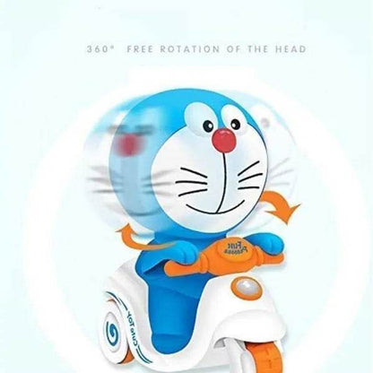 Doraemon push and go toy riding a white and orange scooter with 360 degree head rotation