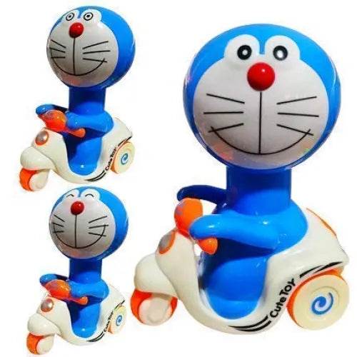 Blue and white Doraemon push and go toy riding a scooter with orange handles and wheels
