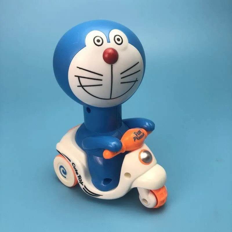 Doraemon push and go toy featuring a blue and white character riding a white scooter toy