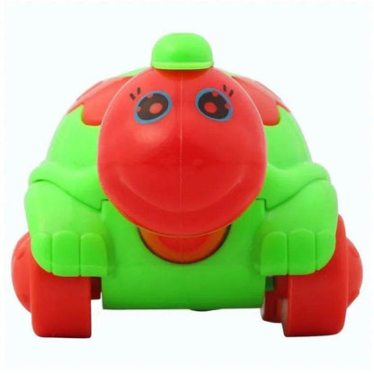 Cute turtle toy for toddlers in bright green and red colors with smiling face and wheels