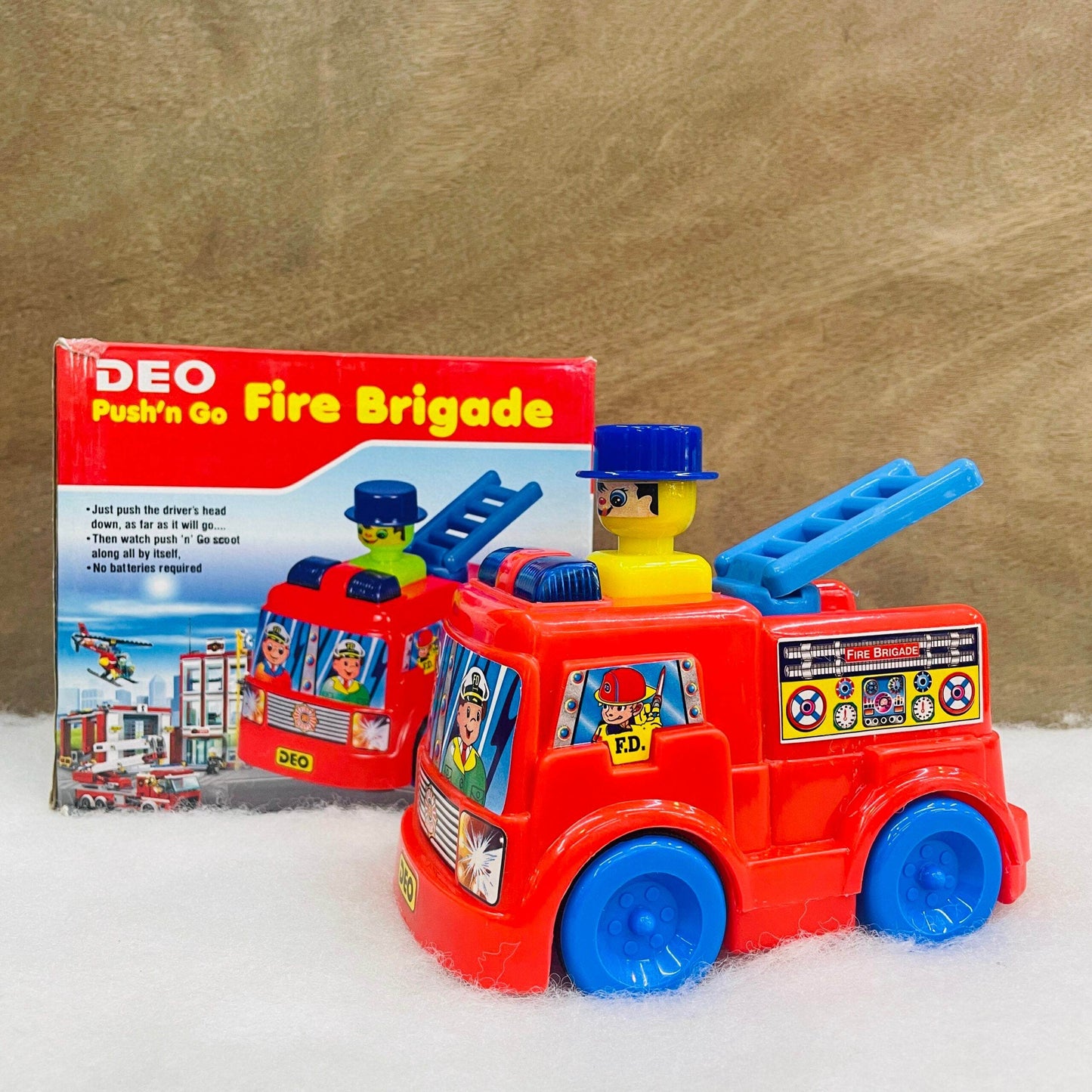 Push and go fire truck toy in red with blue wheels and ladder from T-Rex the toyland Sitamarhi