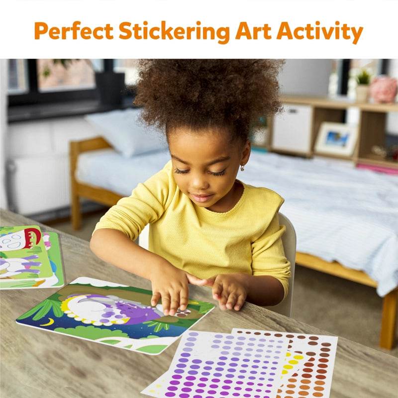 Preschool girl doing dinosaur craft kit for preschoolers sticker activity by Skillmatics at home