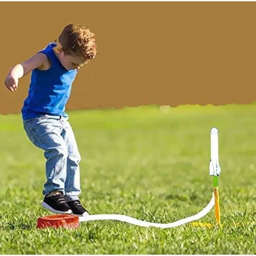 EKTA Jump Rocket Stomp Launcher and 3 Foam Tipped Rockets with Whistling Sound Outdoor Toy for Kids (Flies Upto 150ft, Non- Toxic, No Battery, Age 5+ Years), Multicolour - T-Rex the toyland Sitamarhi