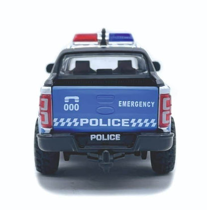 Rear view of blue police pickup truck toy with emergency lights and detailed police markings