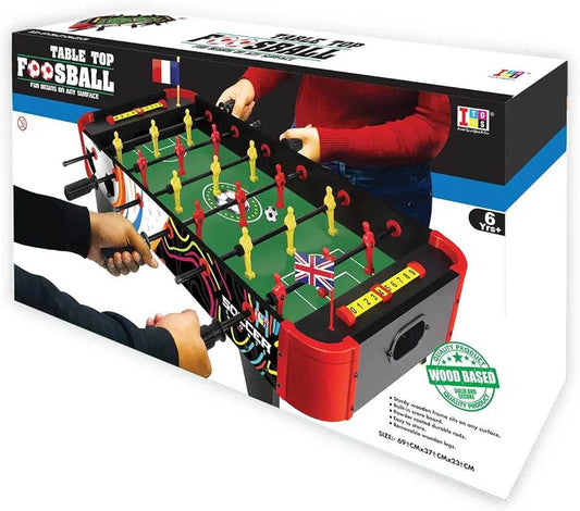 Small foosball football board tabletop game with red and yellow players for kids aged 6 and up