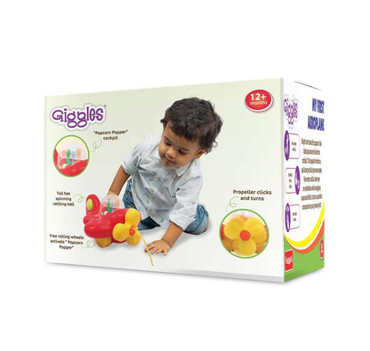 Colorful Giggles toy plane with spinning propeller for 12 months and older, promotes interactive play.