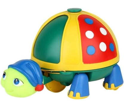 Colorful turtle ninja toy with cheerful face and movable wheels for kids aged 3-6 years