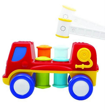 Colorful fire engine truck toy with stacking cylinders for toddlers aged 1-3 years