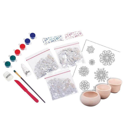 Lippan art kit for kids with paints, glue, brush, spatula, decorative pieces, and design templates