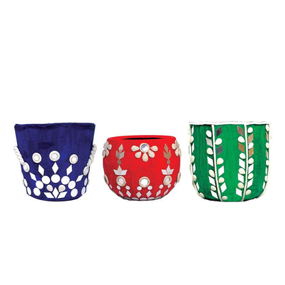 Colorful handcrafted decorative pots from Lippan art kit for kids featuring traditional mirror and clay designs