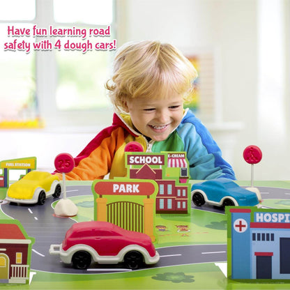 Child playing with road explorer dough kit for kids featuring colorful dough cars and road safety signs