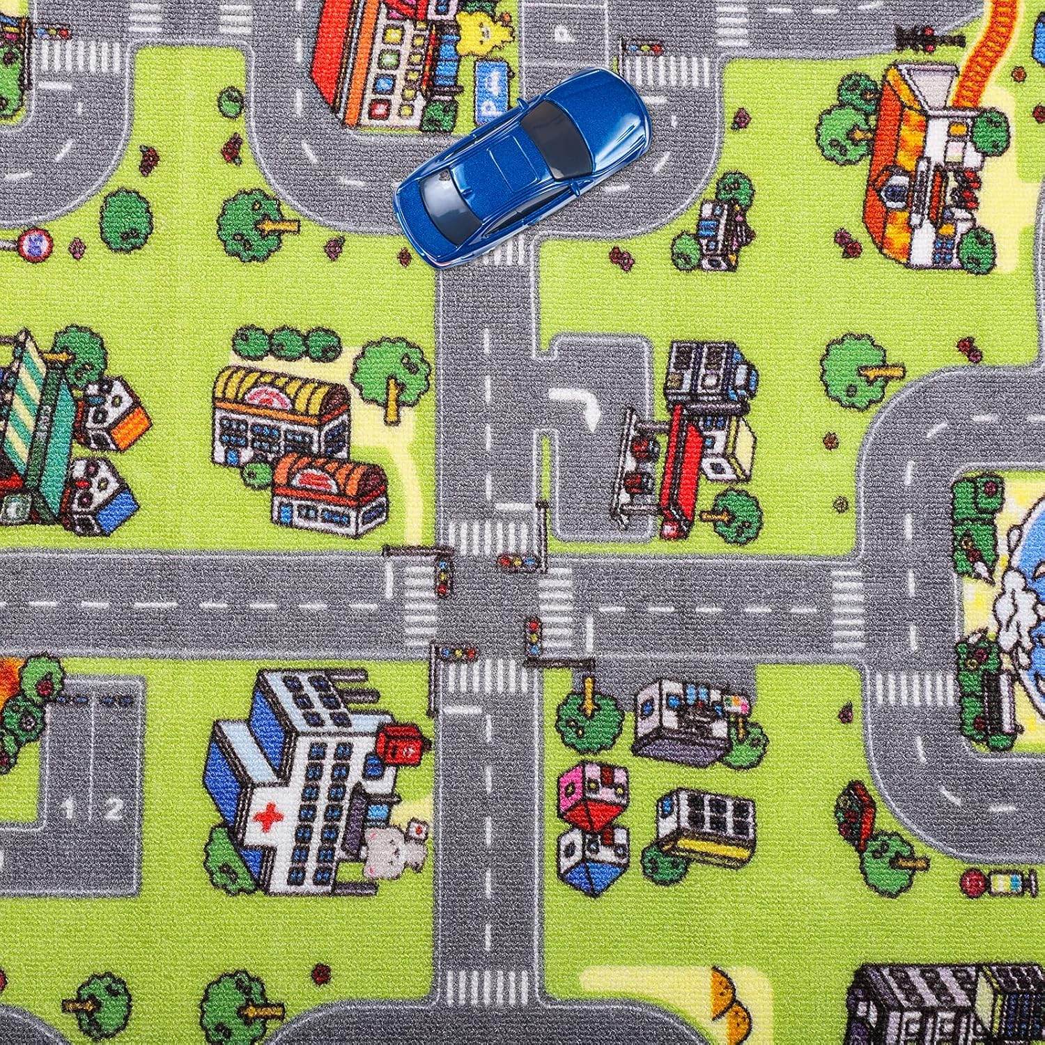 Unimats city road play mat for kids featuring roads, buildings, and a blue toy car on green background