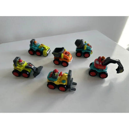 Set of six colorful friction powered construction vehicle toys including excavator bulldozer and forklift on white surface
