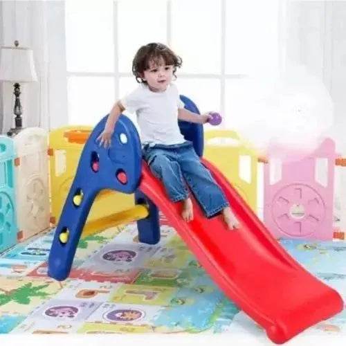 Maskeen indoor play slide for children with red sliding surface and blue steps in a colorful playroom