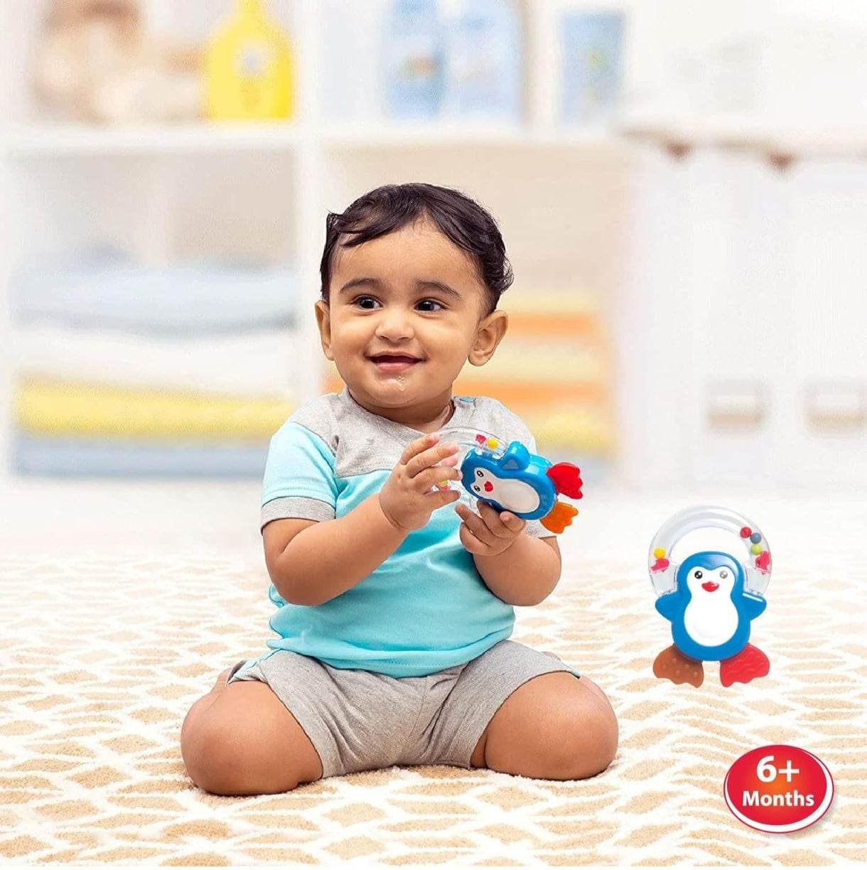 Colorful T-Rex toyland gift set with penguin rattle for newborns and babies 6 months and up
