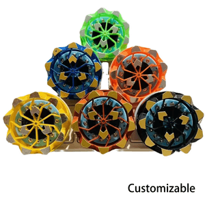 Colorful customizable gyro wheel toy set featuring bright orange, green, and blue wheels for ages 3 and up