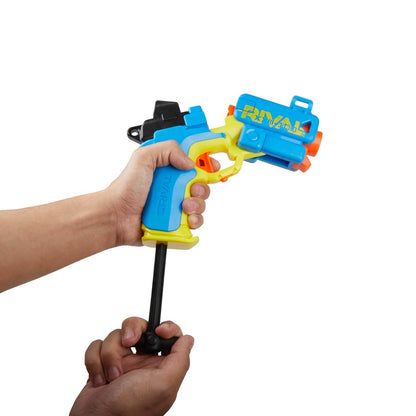 Hand holding a colorful Nerf Rival Pilot blaster toy gun with blue yellow and orange details