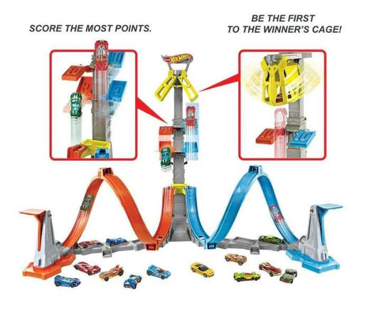 Hot Wheels action playset with multiple loops, ramps, cars, and winner's cage for competitive racing
