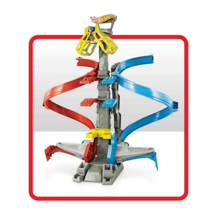 Hot Wheels action playset with red and blue spiral tracks and a yellow launcher stand