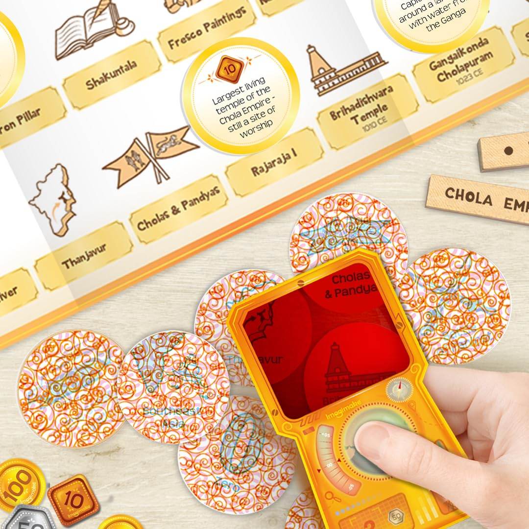 Hand holding a yellow device over a game board with circular patterned pieces in Imagimake Mapology History Quest