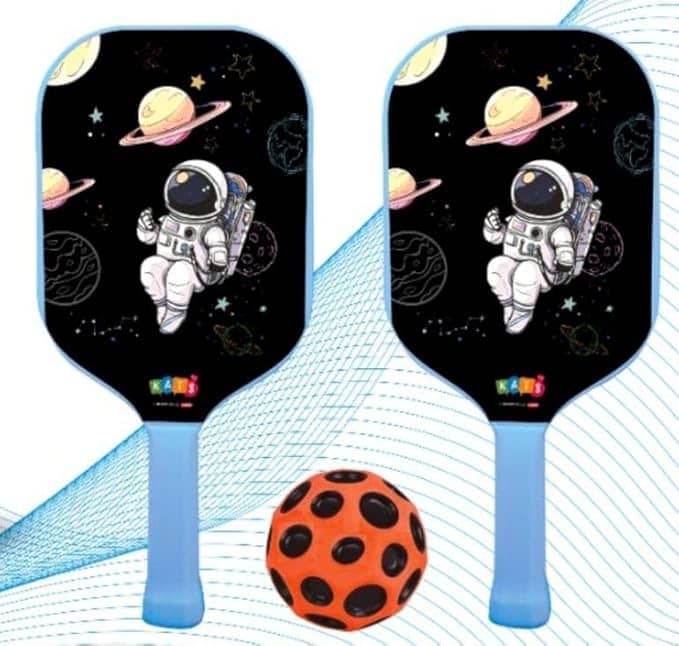 Two blue racket pickleball paddles with astronaut design and a bright orange ball for kids
