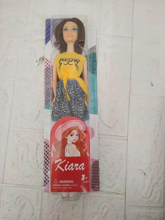 Kiara doll for girls wearing yellow top and leopard print skirt in clear packaging from T-Rex the toyland Sitamarhi