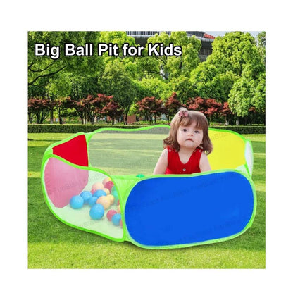 Kids ball pool with balls in a colorful pop-up playpen with a toddler playing outdoors