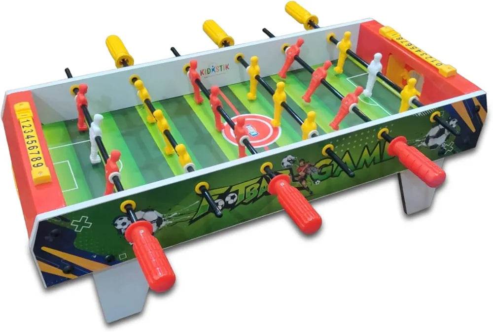 Junior football board game foosball table with red and yellow player figurines and red handles