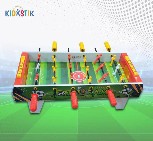 Kidstik junior football board game with colorful players and red yellow handles on a green field