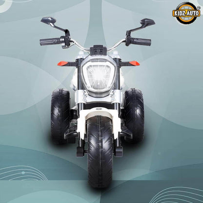 white ride on a bike for toddlers with headlight and durable tires