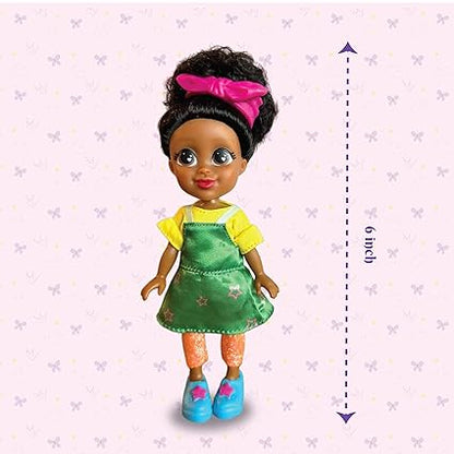 Preschool hairstylist doll with curly hair, pink bow, green dress, yellow shirt, and blue shoes measuring 6 inches
